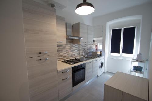 Cocina, Appartamento piazza Buccelli a 10 mt dal mare in Varazze