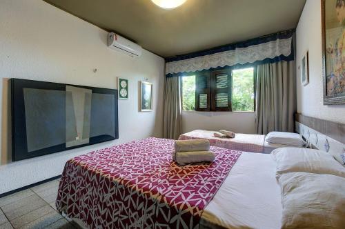Casa Jardim na praia do Cumbuco com piscina por Carpediem