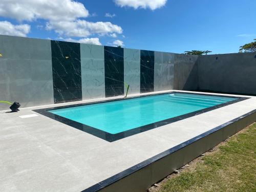 泳池, Casa por do sol in 庫穆魯薩迪巴