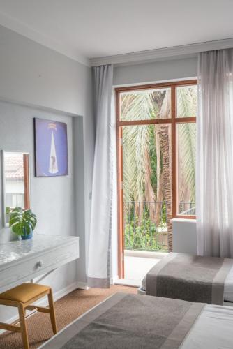 Delight Deluxe Port Room Type - Economy Triple Room