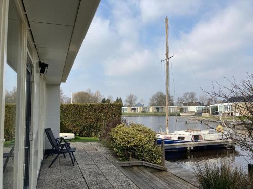 Detached house on the water with jetty in Langweer Frl