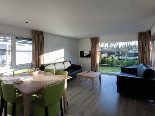  Nice chalet with dishwasher, surrounded by forest in De Bult