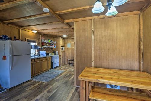 Cozy Cookson Cabin with Fire Pit 1 Mi to Lake! - image 4
