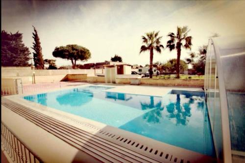 Appartamento Isabella climatizzato con giardino privato gîte à louer Torre Colimena