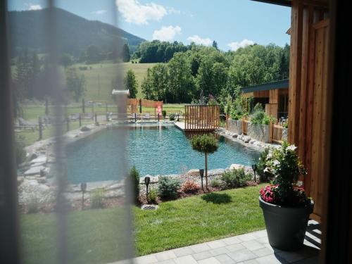 Wellness und Brunch Hotel MorgenZeit beheizter Naturteich Genuss Frühstück bis 13 Uhr Hochkönig Sommercard in Maria Alm am Steinernen Meer, Österreich