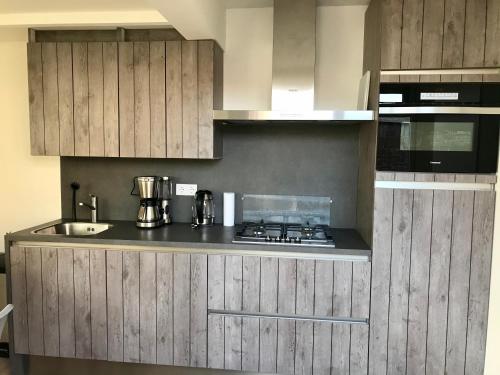 Kitchen, Ferienhaus Genießen am Meer mit Wellnesszugang in Egmond aan Zee