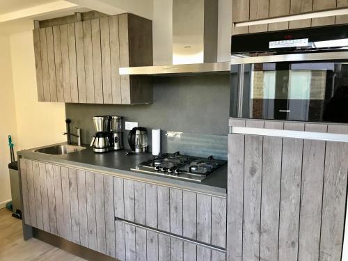 Kitchen, Ferienhaus Genießen am Meer mit Wellnesszugang in Egmond aan Zee