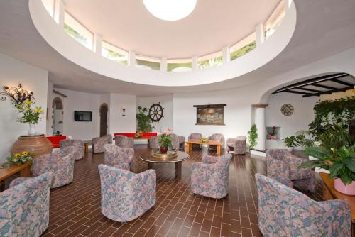 Jagatud salong / TV-ala, Hotel E Residence Cala Di Mola in Porto Azzurro