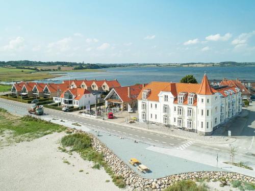 6 person holiday home on a holiday park in Hejls