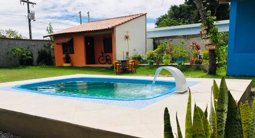 Swimming pool, Casas Aconchegantes Temporada in Parque Balneario Sao Francisco