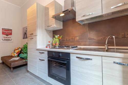 Kitchen, Galvani Apartments in Terni