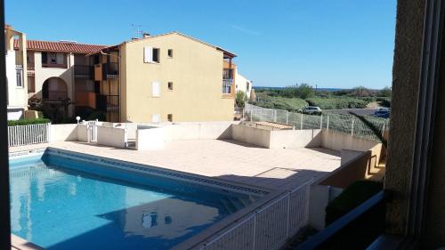 Swimming pool, Appartement 2 Pieces Vue Piscine plage Richelieu CAP D'AGDE near La Cabane du Mail