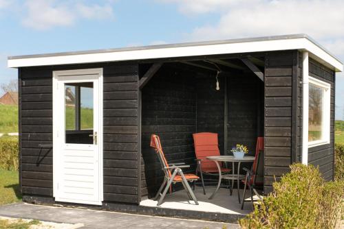 Erkély/terasz, Vakantiewoning Oer it fjild in Holwerd