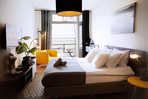 Modern Hideout Ace Location Room Type - Deluxe Double Room with Balcony