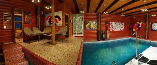 Villa på 80 m² i Hodyliv, med 1 sovrum och 1 badrum (privat) (Luxury apartments with pool and sauna in the Villa) in Hodyliv
