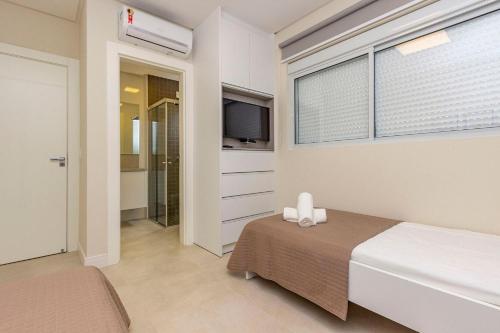 203 Mario Guilherme - Apto Novo 2 suites 05 pessoas Condominio com Piscina - Centro de Bombinhas