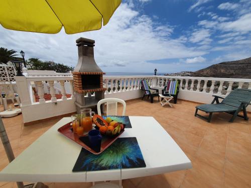  Rooftop sun lounge with ocean views, Pension in Los Caideros