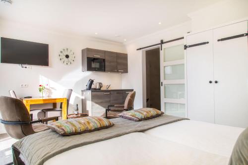 Luxe kamer Chambre Renard met eigen terras in Zoutelande