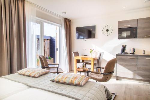 Luxe kamer Chambre Renard met eigen terras in Zoutelande