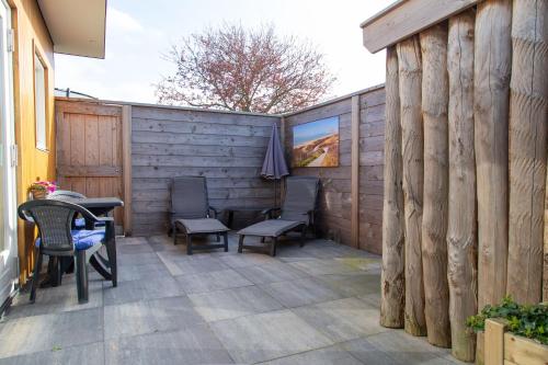 Luxe kamer Chambre Renard met eigen terras in Zoutelande