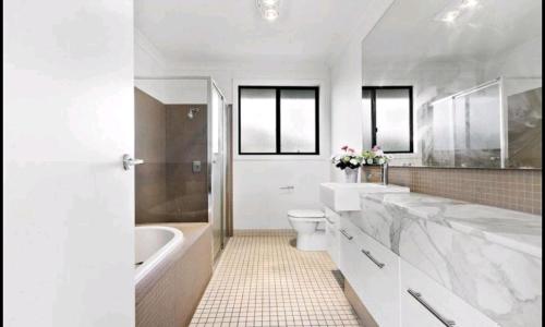 Not entire house!! Cozy two bedrooms with private bathroom and parking