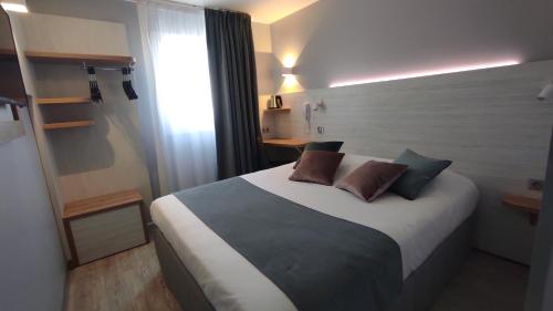 photo chambre Kyriad Montpellier Sud - A709