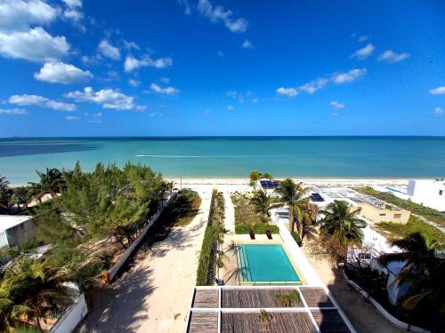 97984 Ocean views from all the bedrooms of this Deluxe beachfront Condo, Paradise in Chicxulub, Mexico