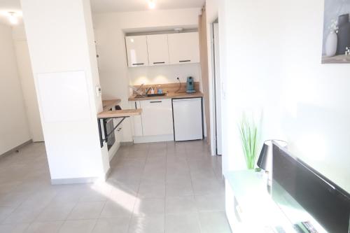 dapur, Logement Entier - Appartement T2 Confort - Toulouse - Balcon Aménagé (Logement Entier - Appartement T2 Confort - Toulouse - Balcon Amenage) in Avenue de Fronton