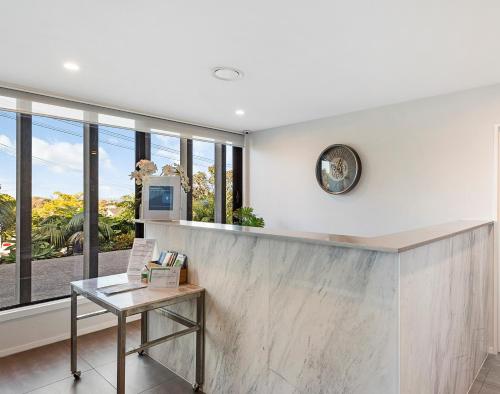 ردهة, موتيل وشقة فندقية فيرنز بيركينهيد (FERNZ Motel and Serviced Apartments Birkenhead) in الشاطئ الشمالي