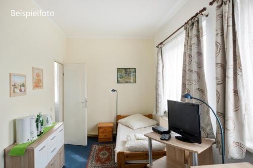 Pension GP3, Zimmer mit Kochnische und Duschbad vor den Toren Berlins in Dallgow, Deutschland