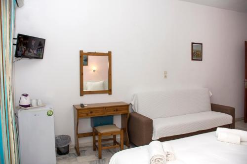 Revekka Rooms - Tap to explore photos