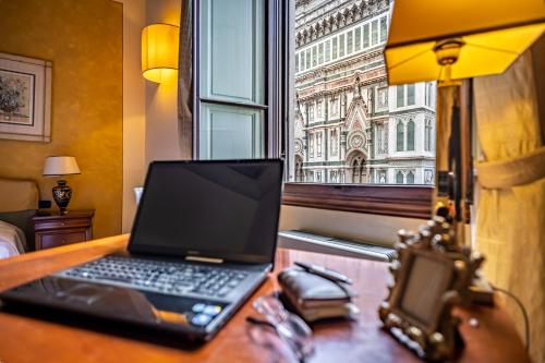 Palazzo Gamba Apartments al Duomo Room Type - Apartment with 2 bedrooms and view of the Dome of the Cathedral (4 Adults)
