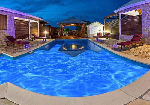 Maison d'une chambre avec piscine partagee jacuzzi et jardin clos a Anse Bertrand - Location saisonnière - Anse-Bertrand