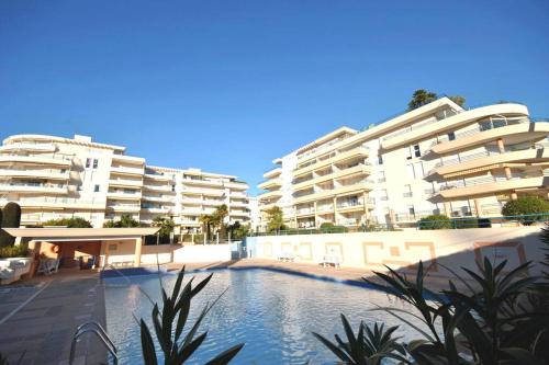 T2 climatisé à 5 minutes à pied de la plage avec parking, piscine et wifi