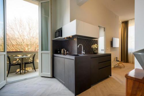 Kitchen, Mysuiteshome Apartments in East Bologna