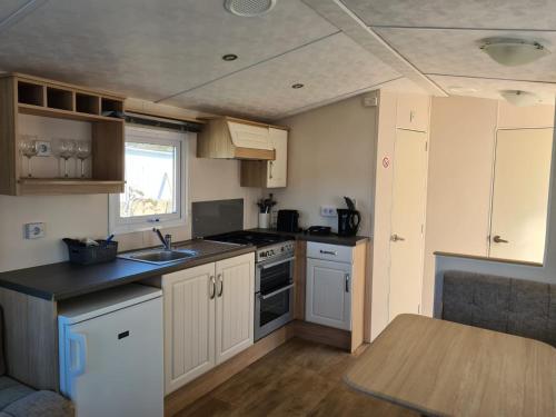 廚房, Chalet Playa direct aan zee in IJmuiden in 艾默伊登