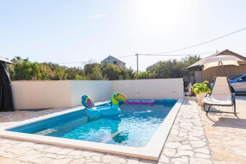 Villa Spark with heated pool in Rogoznica Zecevo