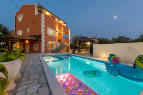 Villa Spark with heated pool in Rogoznica Zecevo