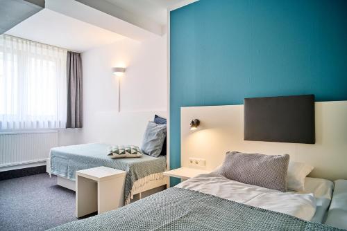 Brunnenhof City Center Room Type - Six-bed Room Facing The Courtyard 