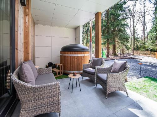 Nice holiday home in Biron with barrel sauna and hot tub