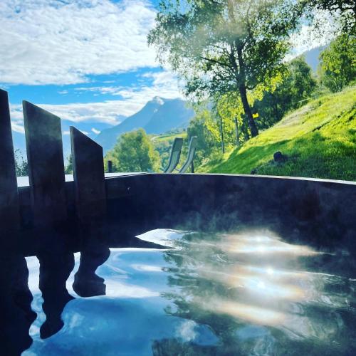 Eco Lodge with Jacuzzi and View in the Swiss Alps