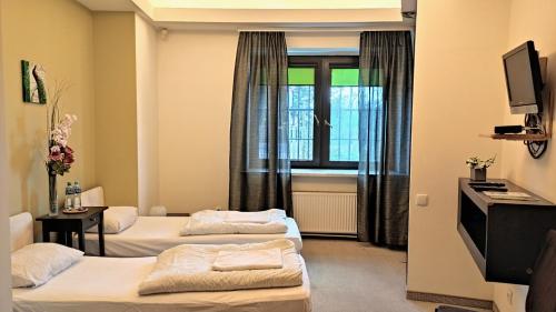Helvetia Plus B&B - PRIVATE ROOMS and APARTMENTS, Varšava (fotografie 5)