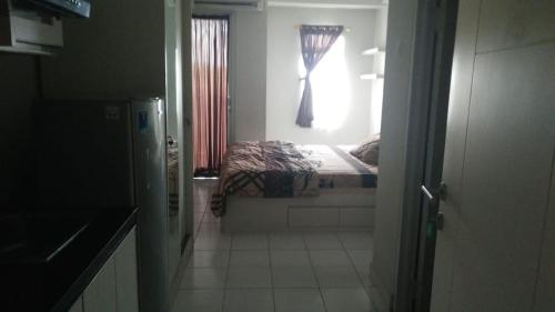 Dramaga Tower Apartemen Rendi Room