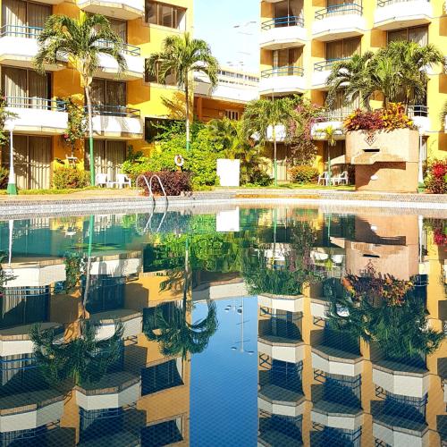 Swimming pool, Hotel Margarita Dynasty near Santiago Mariño Caribbean International Airport