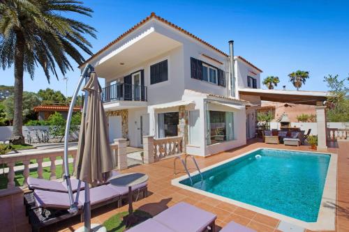 Villa Llevant, aire acondicionado, piscina, wifi, parking, barbacoa, cerca de la playa gîte à louer Cala Figuera