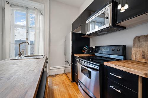 Old Port Montreal Apartments by Restavio