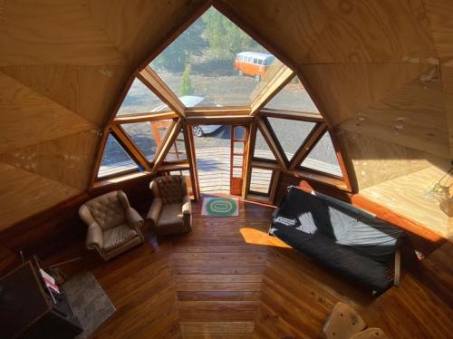 Domo Conguillio Conecta con tu energía sagrada junto al Salto Truful Truful con una vista majestuosa que podrás disfrutar en una tinaja Una experiencia que alineará tu espíritu y tu energía interior Vívelo