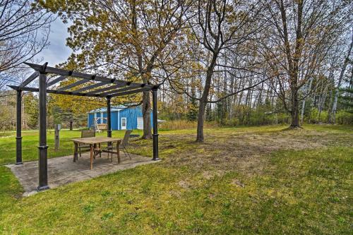 Charlevoix Cabin with Patio - Walk to Lake! - image 2