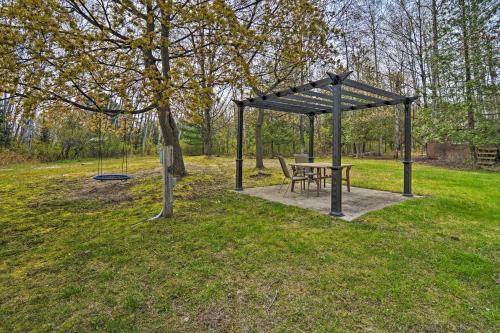 Charlevoix Cabin with Patio and Grill - Steps to Lake!