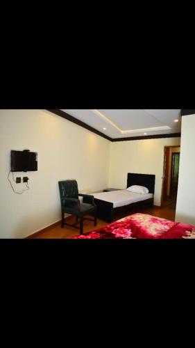 客室内ベッド, Bhurban Inn in ブハーバン